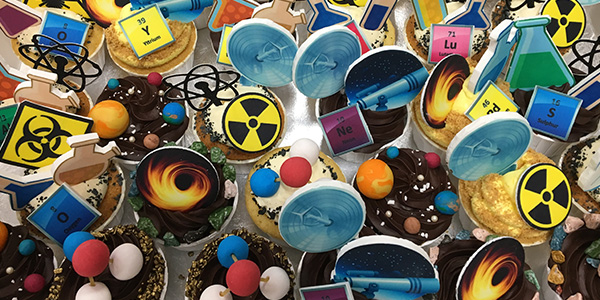 awesome nerdy cupcakes with astronomy, physics, and chemistry decorations